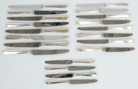 Twenty hallmarked silver handled stainless steel bladed knives, comprising eight dinner knives and