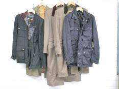 Two gentleman's Belstaff jackets, one waxed the other with leather trim, both size M, two overcoats,