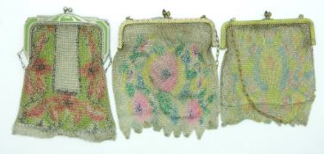 Three painted 19th/20thC chain link purses with enamel style clasps, largest 15 x 12cm