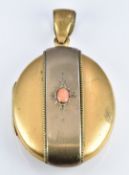 Victorian gilt locket set with a coral cabochon, 2.5 x 5cm