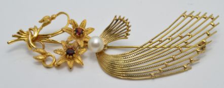A 9ct gold foral brooch set with garnets and another 9ct gold brooch set with a pearl, 12.6g