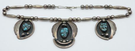 A c1920 Native American Navajo silver necklace set with turquoise, 81.1g, 44cm