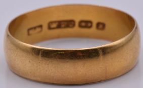 A 22ct gold wedding band/ ring, Birmingham 1897, 5.5g, size W/X