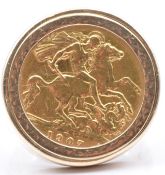A 1907 gold half sovereign in 9ct gold ring mount, 10.7g, size R
