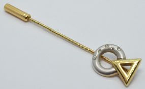 A yellow metal bi-coloured stick pin set with diamonds marked 333, length 5cm, 1.8g