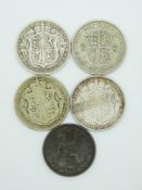 1863 Victoria bronze bun head penny VF, together with four George V half crowns, 1915, 1920, 1921