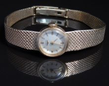 Longines 9ct gold ladies wristwatch ref. 20679 with gold hands and baton markers, silver dial and