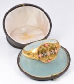 An early Victorian bracelet set with coral and rose cut diamonds, opening to reveal four glass