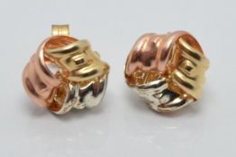 A pair of 9ct gold tri-coloured knot earrings, 0.6g