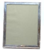 George VI hallmarked silver photograph frame to suit 9 x 7 inch photo, with easel back for either