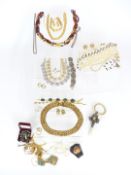 A silver and mother of pearl rattle, pearl necklaces, Butler & Wilson necklace, D'Orlan, a 9ct