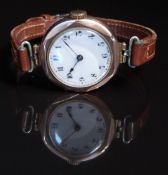 9ct gold ladies wristwatch with blued hands, black Arabic numerals, gilt minute markers. white