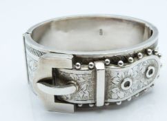 Victorian hallmarked silver bangle in the form of a buckle, with engraved decoration