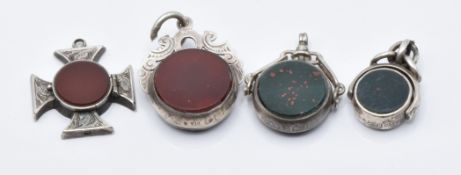 A Victorian hallmarked silver swivel fob, hallmarked silver locket, and two Edwardian silver