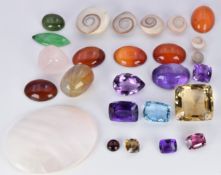 An aquamarine, jade cabochons, five amethysts, two citrines, garnets, agate, etc