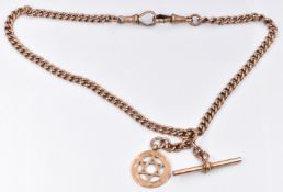 A 9ct rose gold Albert/ watch chain with 9ct gold charm/ pendant, 34g