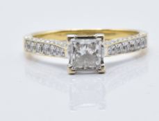 An 18ct gold ring set with a 0.7ct princess cut diamond and diamond encrusted shoulders, with GIA