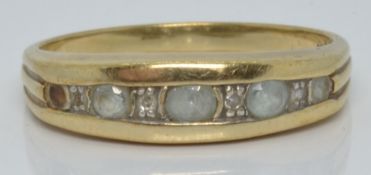 A 9ct gold ring set with aquamarines and diamonds, 2.2g, size N