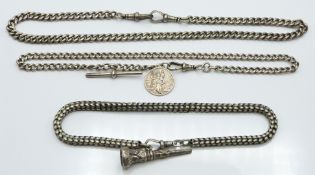Two Victorian silver Alberts, a silver St Christopher pendant, silver watch key with engraved