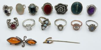 A collection of silver rings set with amethyst, agate, quartz etc and a Victorian stick pin