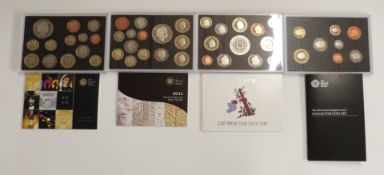Four Royal Mint proof deluxe coin sets , 2007, 2010, 2011 and a collector's edition 2013 set, all