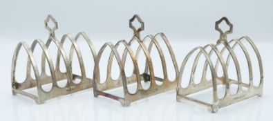 Art Deco set of three five bar hallmarked silver toast racks, London 1933 maker Sir John Bennett