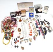 A collection of costume jewellery including watches, silver pocket watch, Victorian locket, carved