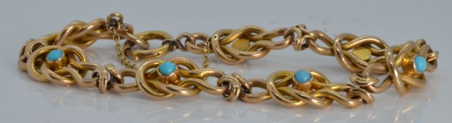 WITHDRAWN   Edwardian yellow metal knot bracelet set with turquoise, 13.2g