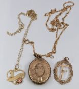 Two 9ct gold pendants, two 9ct gold chains (2.9g) and a Victorian engraved locket