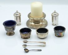 Art Deco hallmarked silver four piece cruet set comprising two open salts with blue glass liners and