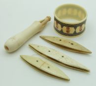 A 19thC Indian Madras ware ivory napkin ring, bone shuttles and an ivory stiletto in holder, longest