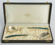 David Andersen cased pair of Norwegian silver gilt and green guilloché enamel salad servers,