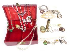 A collection of jewellery including buckles, silver pendants, silver brooches, Art Deco crystal