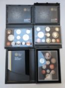 Three Royal Mint United Kingdom proof coin sets with certificates and outer packaging, two 2008