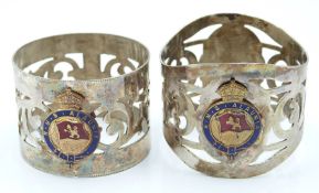 A pair of silver plated Cunard Line RMS Alaunia napkin rings with enamel decoration