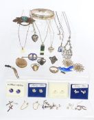 A collection of silver jewellery including brooches, earrings, etc.