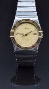 Omega Constellation wristwatch ref. 1410.10.00 with date aperture, luminous and gold hands, gold dot