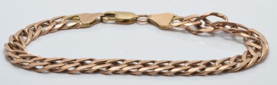 A 9ct rose gold curb link bracelet, 12.2g