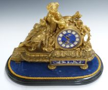 Vincenti & Cie 19thC French figural brass ormolu mantel clock, the female seated figure dressed in