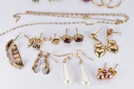 A collection of 9ct gold earrings including ruby, garnet and pearl, 7.4g
