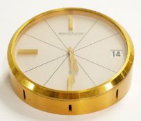 Jaeger-LeCoultre brass cased desk clock, the ivory coloured dial with baton numerals and calendar