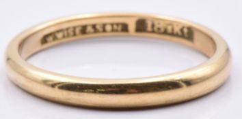 A 18ct gold wedding band/ ring by W Wise & Sons, 3.1g, size P
