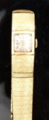 Onsa 18ct gold ladies wristwatch with gold hands and hour markers, silver dial and 17 jewel
