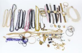A collection of costume jewellery including beads, watches etc
