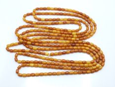 Baltic amber necklace made up of oval beads, 85g