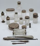 Six hallmarked silver mounted dressing table bottles, including one Victorian, two further