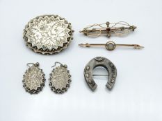 Victorian brooch and matching earrings with chased decoration, Victorian white metal brooch in the