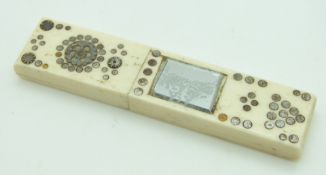 Georgian bone needle case with cut steel decoration and inset mirror, length 8cm