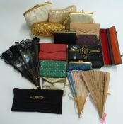 A collection of vintage evening bags, purses and fans