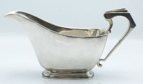 Edward VIII hallmarked silver sauce boat of modernist or Art Deco form, Birmingham 1936 maker
